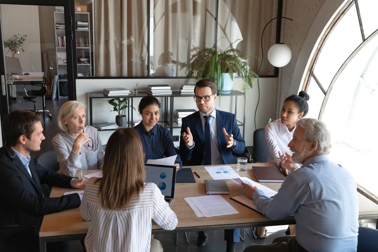 An executive team in a refined corporate retreat setting